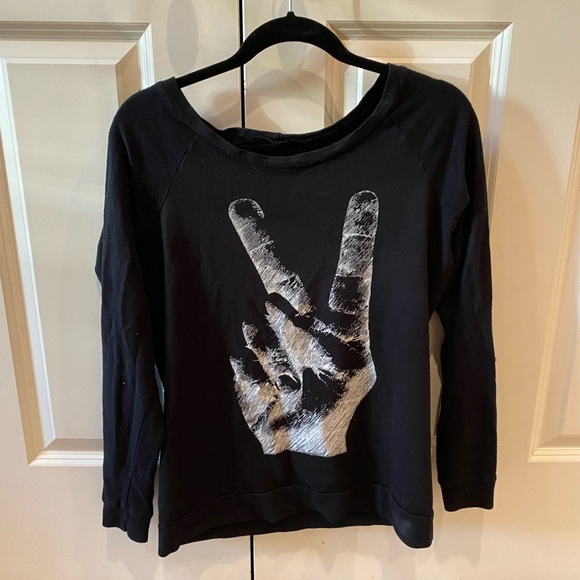 Peace sign appears painted in white. Thin over the head sweatshirt - Picture 1 of 12